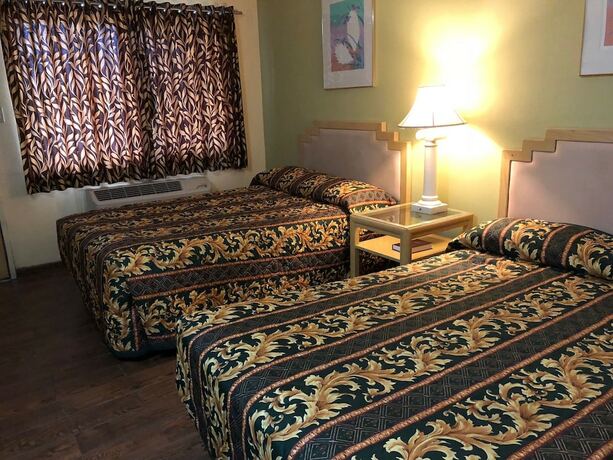 Imagen de la habitación del Hotel Sun Star Inn. Foto 17