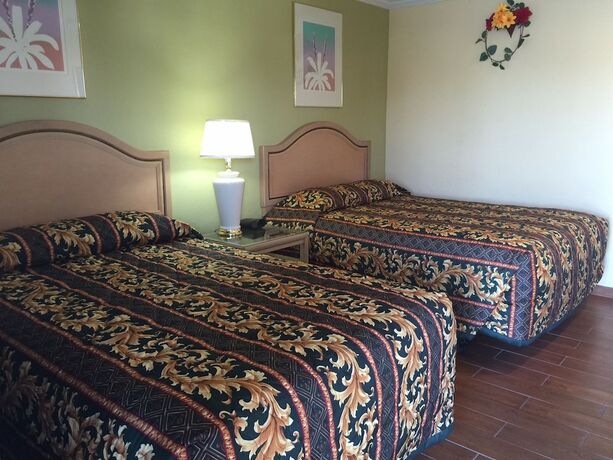 Imagen de la habitación del Hotel Sun Star Inn. Foto 19