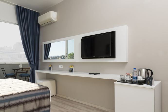 Imagen de la habitación del Hotel Sun Suit. Foto 13