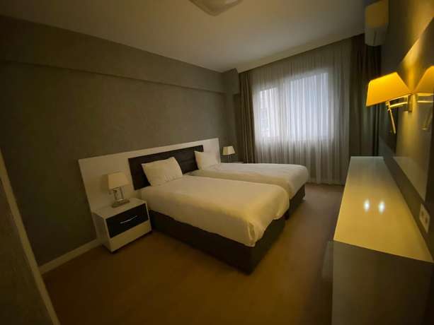 Imagen de la habitación del Hotel Sun Suit. Foto 14