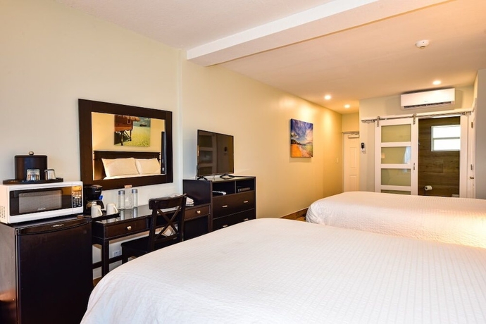 Imagen de la habitación del Hotel Sun Tower and Suites On The Beach. Foto 12