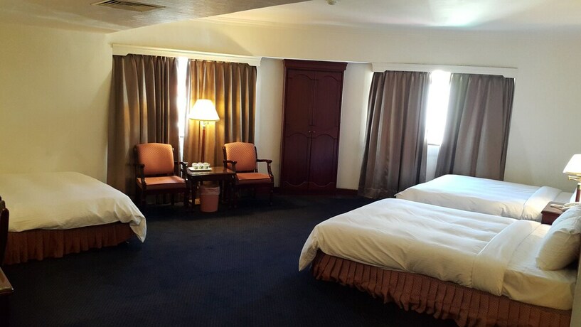 Imagen de la habitación del Hotel Sun Wang. Foto 13