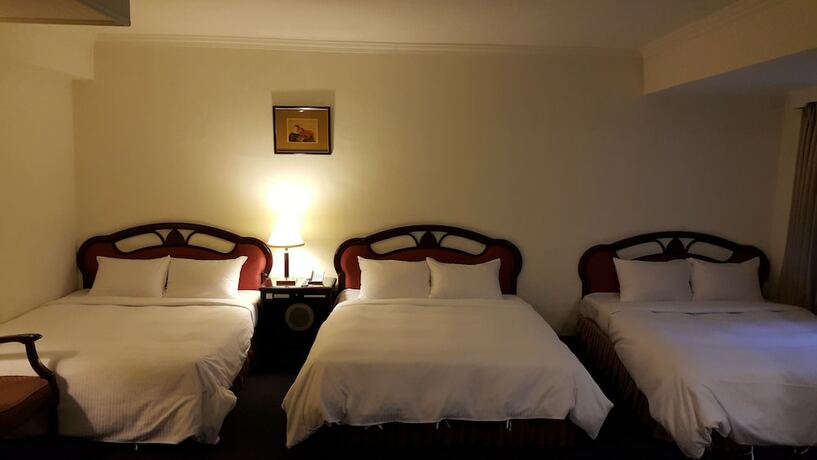 Imagen de la habitación del Hotel Sun Wang. Foto 19