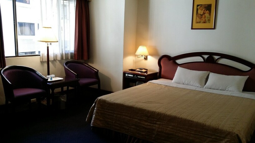 Imagen de la habitación del Hotel Sun Wang. Foto 20