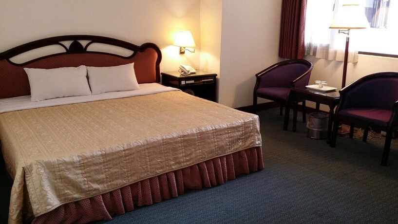 Imagen de la habitación del Hotel Sun Wang. Foto 22