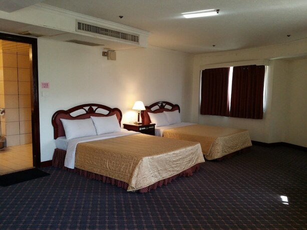 Imagen de la habitación del Hotel Sun Wang. Foto 23