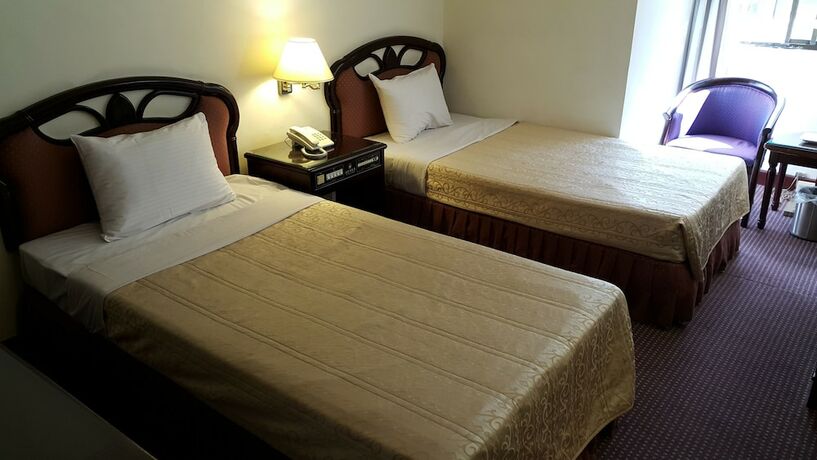 Imagen de la habitación del Hotel Sun Wang. Foto 27