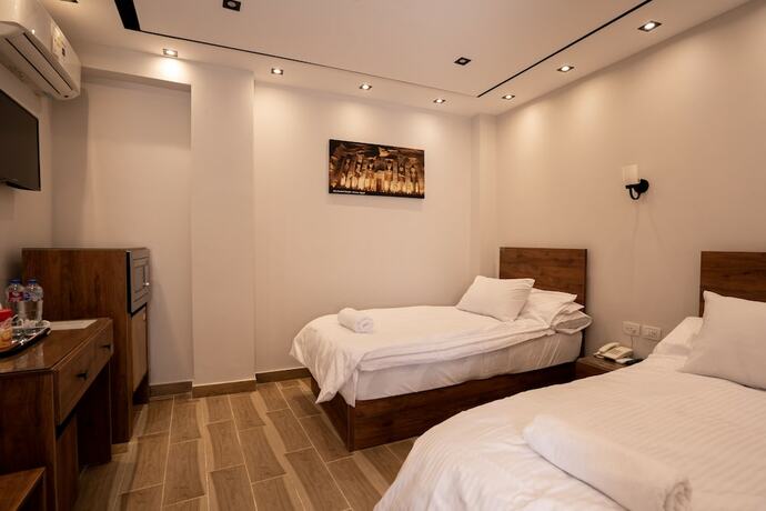 Imagen de la habitación del Hotel Sun and Sand Guest House. Foto 14