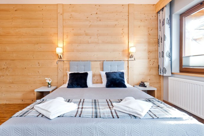 Imagen de la habitación del Hotel Sun and Snow Resorts Lipki Park. Foto 3