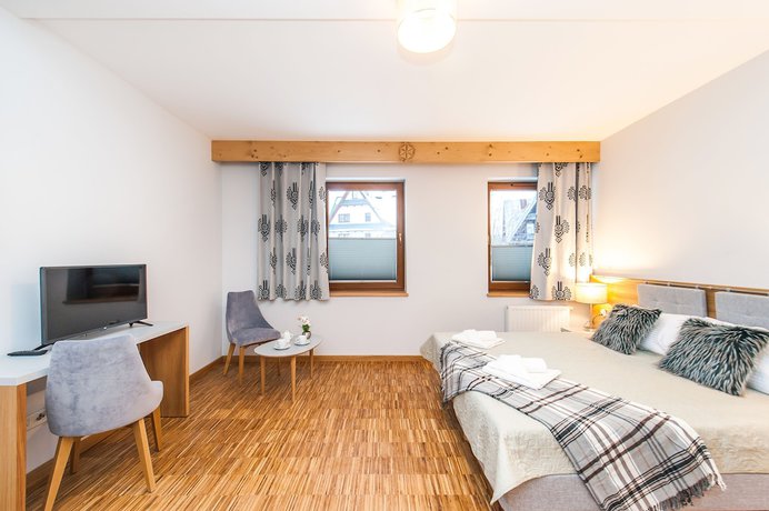 Imagen de la habitación del Hotel Sun and Snow Resorts Lipki Park. Foto 4