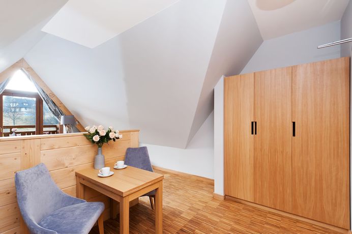 Imagen de la habitación del Hotel Sun and Snow Resorts Lipki Park. Foto 10