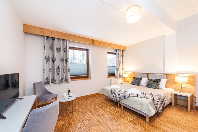 Imagen de la habitación del Hotel Sun and Snow Resorts Lipki Park. Foto 11