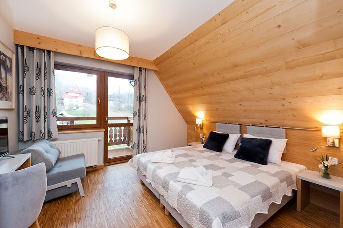 Imagen de la habitación del Hotel Sun and Snow Resorts Lipki Park. Foto 13