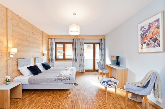 Imagen de la habitación del Hotel Sun and Snow Resorts Lipki Park. Foto 18