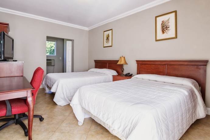 Imagen de la habitación del Hotel Sun and Surf Inn. Foto 5