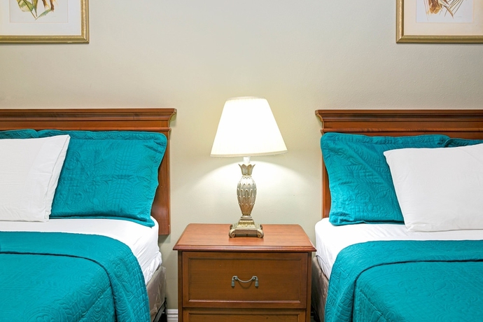Imagen de la habitación del Hotel Sun and Surf Inn. Foto 9