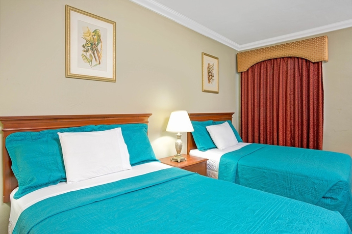 Imagen de la habitación del Hotel Sun and Surf Inn. Foto 10