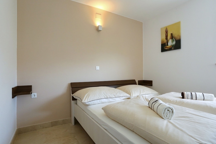 Imagen de la habitación del Hotel SunAdria Apartments. Foto 15