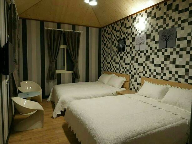 Imagen de la habitación del Hotel SunShine Farmstead. Foto 14