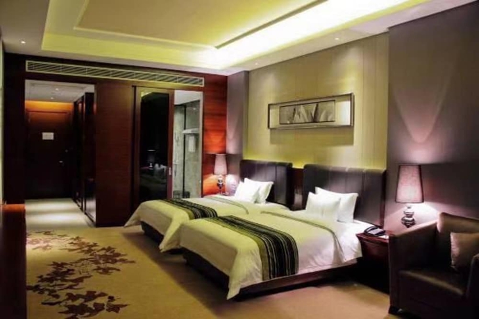 Imagen de la habitación del Hotel Sunbelieve International Hotel. Foto 2
