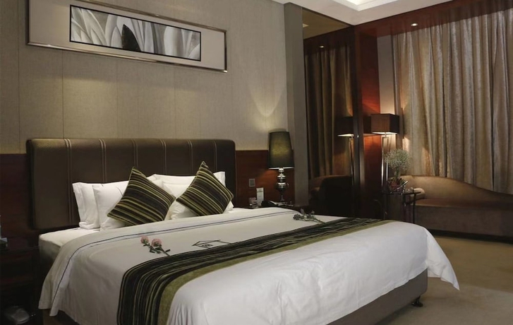 Imagen de la habitación del Hotel Sunbelieve International Hotel. Foto 6