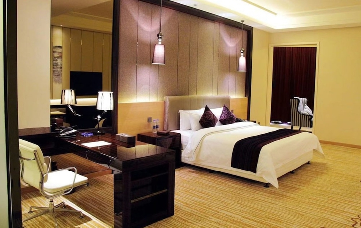 Imagen de la habitación del Hotel Sunbelieve International Hotel. Foto 8