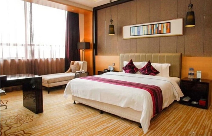 Imagen de la habitación del Hotel Sunbelieve International Hotel. Foto 9