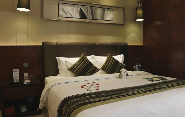 Imagen de la habitación del Hotel Sunbelieve International Hotel. Foto 11