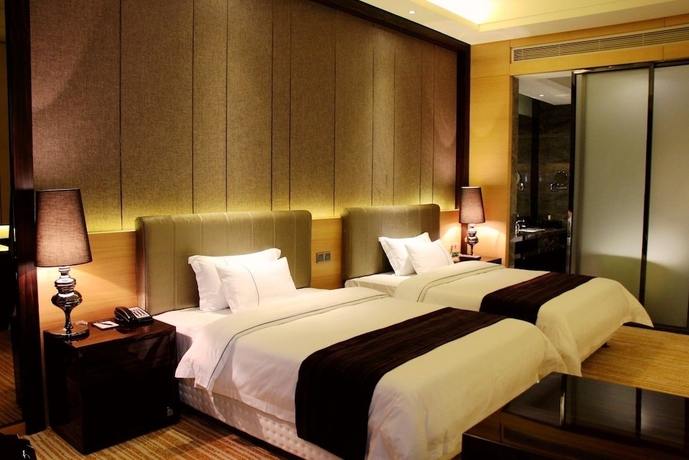 Imagen de la habitación del Hotel Sunbelieve International Hotel. Foto 14
