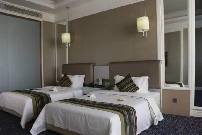 Imagen de la habitación del Hotel Sunbelieve International Hotel. Foto 16