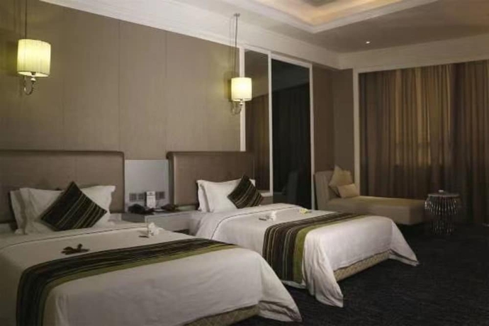 Imagen de la habitación del Hotel Sunbelieve International Hotel. Foto 17