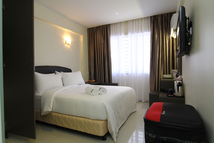 Imagen de la habitación del Hotel Sunbow Residency. Foto 3