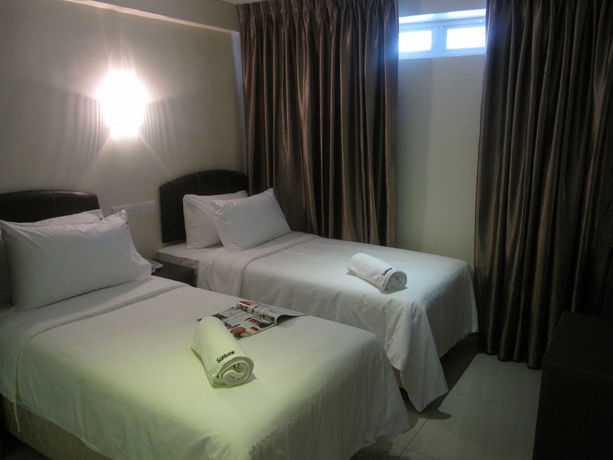 Imagen de la habitación del Hotel Sunbow Residency. Foto 6