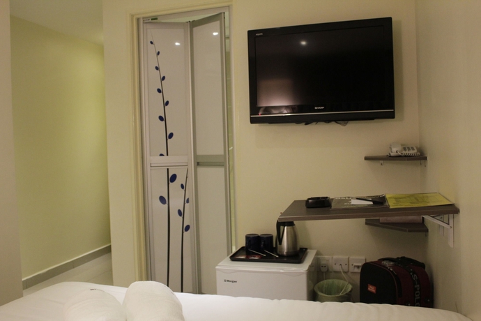 Imagen de la habitación del Hotel Sunbow Residency. Foto 7