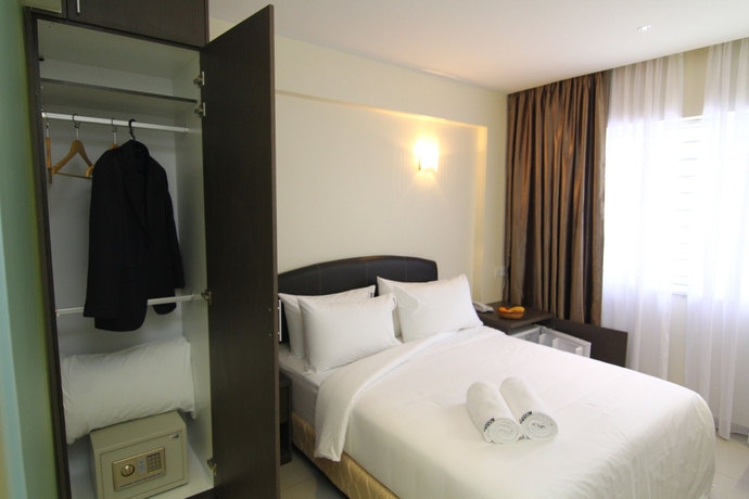 Imagen de la habitación del Hotel Sunbow Residency. Foto 8