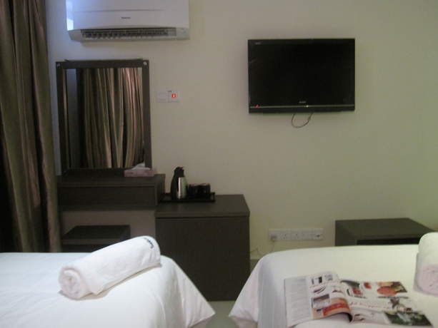 Imagen de la habitación del Hotel Sunbow Residency. Foto 9