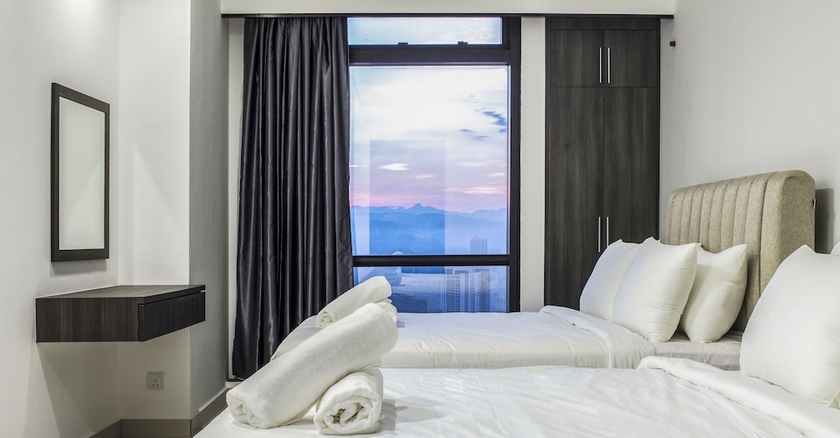Imagen de la habitación del Hotel Sunbow Suites. Foto 5