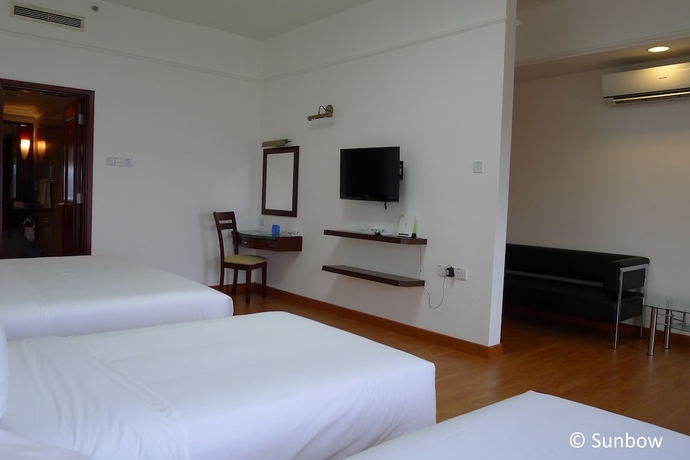 Imagen de la habitación del Hotel Sunbow Suites. Foto 8