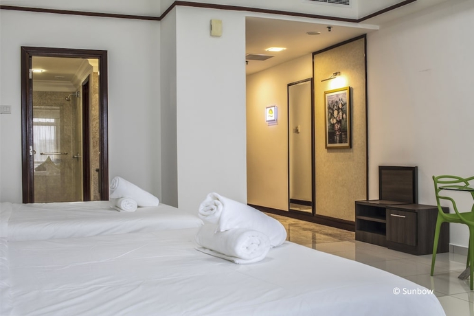 Imagen de la habitación del Hotel Sunbow Suites. Foto 12