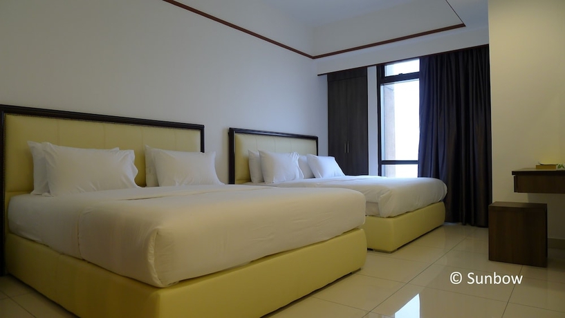 Imagen de la habitación del Hotel Sunbow Suites. Foto 13