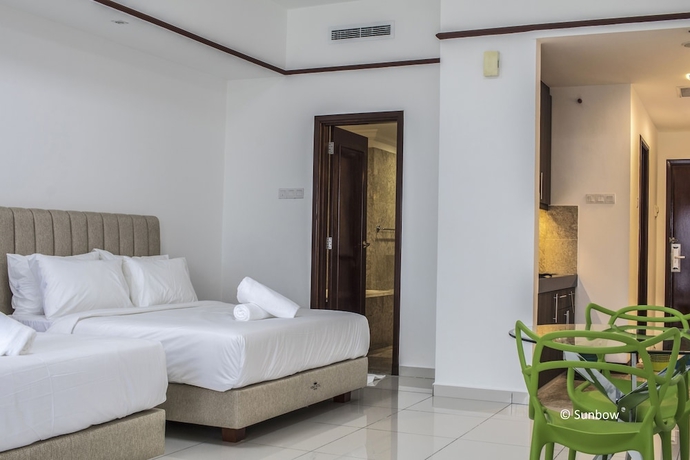 Imagen de la habitación del Hotel Sunbow Suites. Foto 14