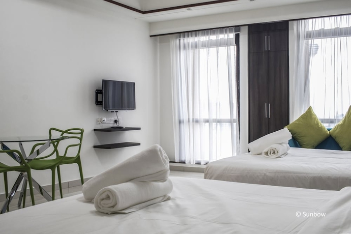 Imagen de la habitación del Hotel Sunbow Suites. Foto 15