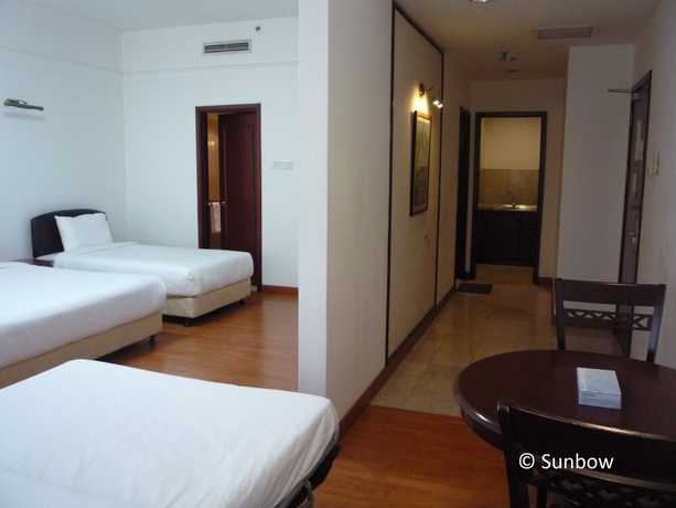 Imagen de la habitación del Hotel Sunbow Suites. Foto 17