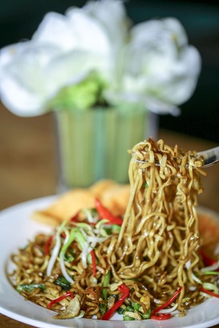 Imagen del bar/restaurante del Hotel Sunbreeze Senayan. Foto 18
