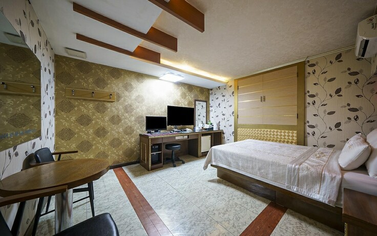 Imagen de la habitación del Hotel Suncheon Abichon. Foto 19