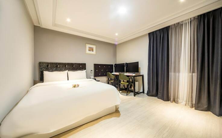 Imagen de la habitación del Hotel Suncheon Plaza. Foto 16