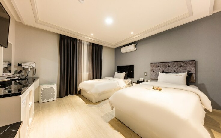 Imagen de la habitación del Hotel Suncheon Plaza. Foto 17