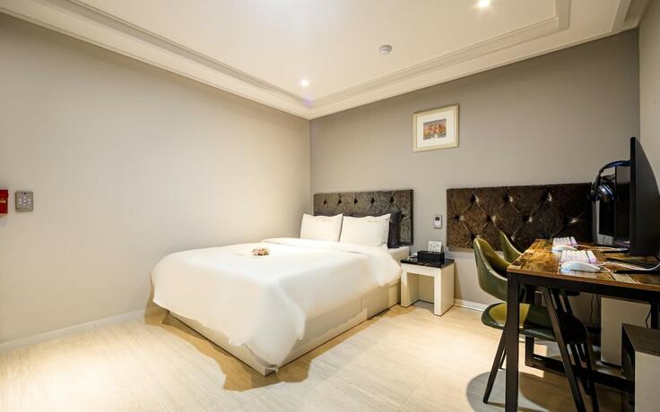 Imagen de la habitación del Hotel Suncheon Plaza. Foto 18