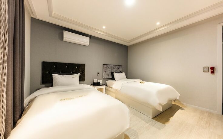 Imagen de la habitación del Hotel Suncheon Plaza. Foto 19