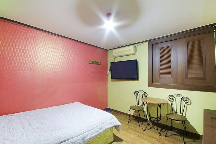 Imagen de la habitación del Hotel Sunchon Opera. Foto 7